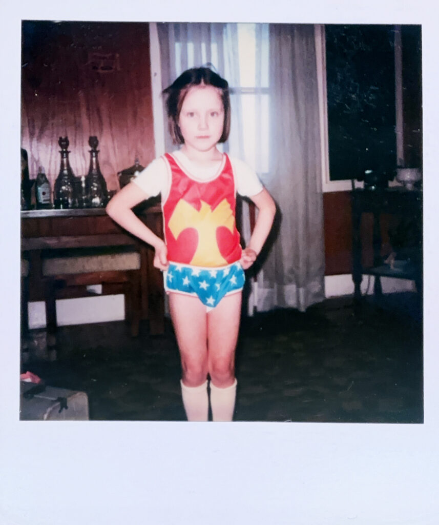 yours truly at 5 years old, feeling very badass in my brand new wonder woman underoos.