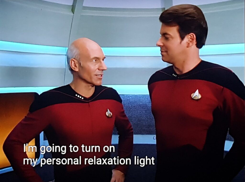 screencap from star trek tng depicting captain picard talking to riker in the turbo lift. captain at the bottom reads, "i'm going to turn on my personal relaxation light."